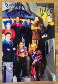 A cast autographed photo poster from the television series, Star Trek Deep Space Nine. Signed poster of Avery Brooks, Rene Auberjonois, Cirroc Lofton, Alexander Siddig, Colm Meaney, Nana Visitor, Armin Shimerman and Terry Farrell in blue ink markers signatures. Photograph Star Trek Deep Space Nine autographs for sale on 8x12 inch picture.