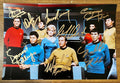 A cast autographed poster of the original Star Trek series from 1966. Signed photo of William Shatner, Leonard Nimoy, Deforest Kelley, Walter Koenig, George Takei, James Doohan, Nichelle Nichols and Majel Barrett in gold ink marker signatures. Photograph autographs for sale on 8x12 inch picture.