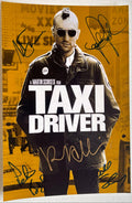 A cast autographed photo poster from the movie, Taxi Driver. Signed photo of Robert De Niro, Martin Scorsese, Jodie Foster, Cybill Shepherd and Peter Boyle in blue and gold ink marker signatures. Photograph autographs for sale on 8x12 inch picture.