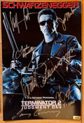 A cast autographed poster of the movie, Terminator 2 Judgement Day. Signed photo of Arnold Schwarzenegger, Linda Hamilton, Edward Furlong, James Cameron, Robert Patrick and Joe Morton in silver ink marker signatures. Photograph autographs for sale on 8x12 inch picture.