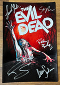 A cast autographed poster of the movie 'The Evil Dead' from 1981. Signed photo of Bruce Campbell, Sam Raimi, Ellen Sandweiss, Betsy Baker and Sarah York in silver ink marker signatures. Photograph autographs for sale on 8x12 inch picture.