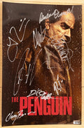 A cast autographed 'The Penguin' movie photo poster. Signed photo by Colin Farrell, Cristin Milioti, Rhenzy Feliz, Deirdre O'Connell, Carmen Ejogo, Theo Rossi, Clancy Brown and Daniel J. Watts in silver ink markers signatures. Photograph The Penguin autographs for sale on 8x12 inch picture.