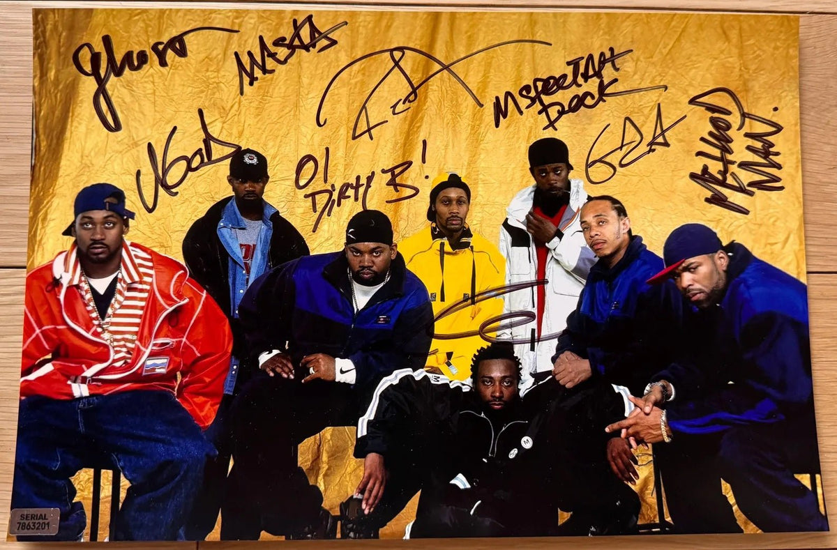 An autographed photo of the hip hop rap band The Wutang Clan. Signed photo of Ol' Dirty Bastard, Method Man, RZA, GZA, Raekwon The Chef, Ghostface Killah, Inspectah Deck, U-God, Masta Killa in black ink marker signatures. Photograph autographs for sale on 8x12 inch picture.