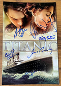 A cast autographed poster of the movie Titanic. Signed photo of Leonardo DiCaprio, Kate Winslet, Bill Paxton, Billy Zane, Kathy Bates and James Cameron in blue ink marker signatures. Photograph autographs for sale on 8x12 inch picture.