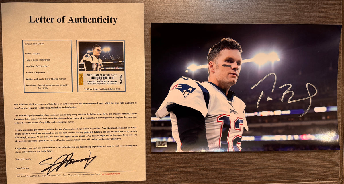 A Topps Fanatics Rookie RC auto autographed photo poster of NFL football quarterback, Tom Brady. Signed photo in silver ink marker signatures.  Photograph Tom Brady autographs for sale on 8x12 inch picture with COA.