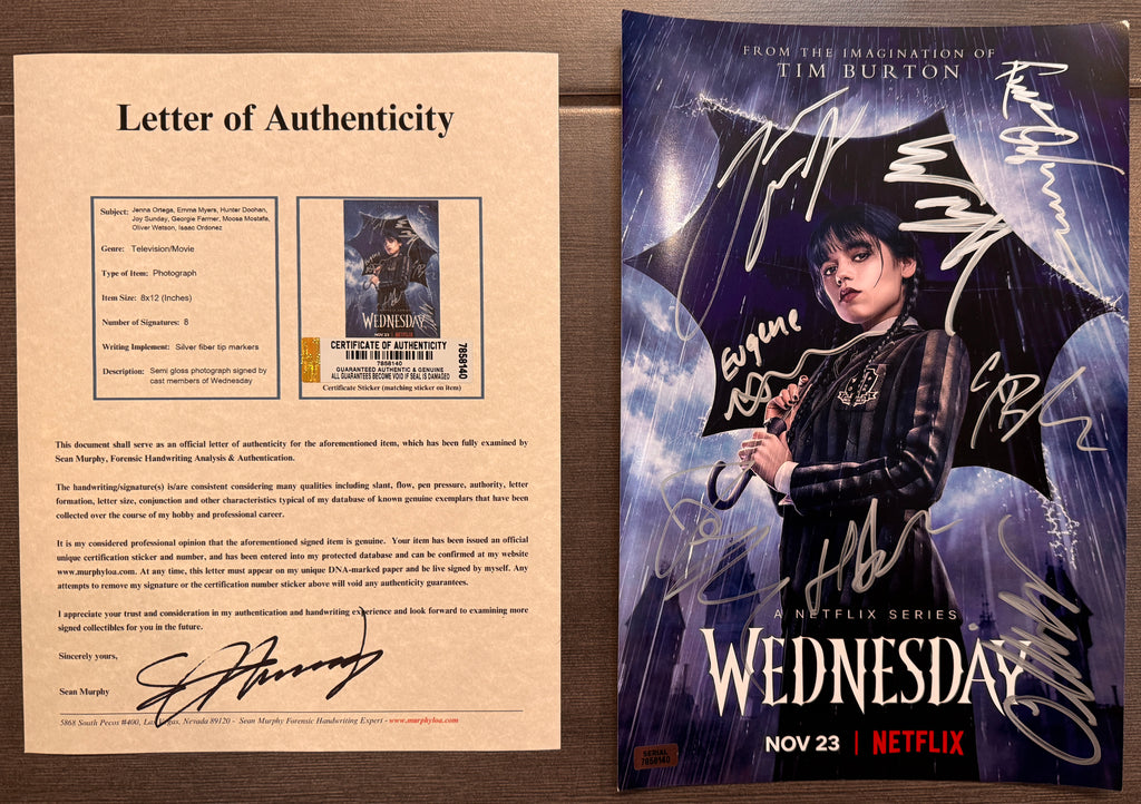 A cast autographed photo poster of the Netflix television series, Wednesday. Signed photo of Jenna Ortega, Emma Myers, Hunter Doohan, Joy Sunday, Georgie Farmer, Moosa Mostafa, Oliver Watson and Isaac Ordonez in silver ink marker signatures. Photograph Wednesday autographs for sale on 8x12 inch picture with COA.