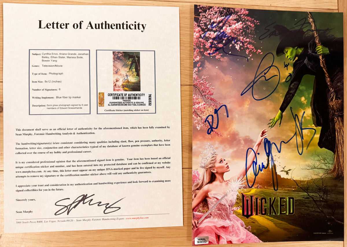 An autographed Wicked poster. Signed photo of Ariana Grande, Cynthia Erivo, Jonathan Bailey, Marissa Bode, Ethan Slater and Bowen Yang in blue ink markers. Photograph autographs for sale on 8x12 inch picture with COA.