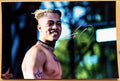 An autographed photo poster of hip hop rapper, XXXTentacion. Signed photo in silver ink marker signatures. Photograph xxxtentacion autographs for sale on 8x12 inch picture.